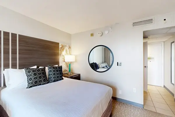 A comfortable sleeping space offering the perfect place to unwind and recharge after a day of activities.