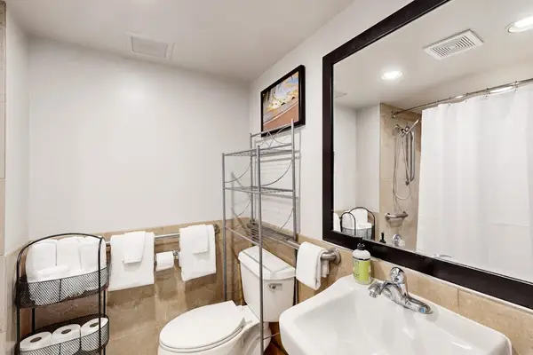 Refresh and recharge in a clean, functional bathroom equipped for your comfort.