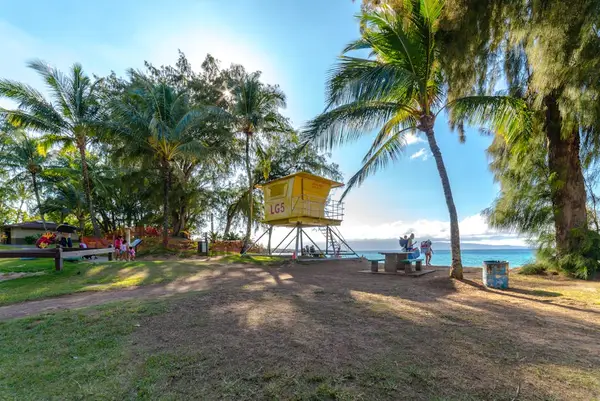 Shaded outdoor lookout area with ocean views — perfect for relaxing in the breeze.