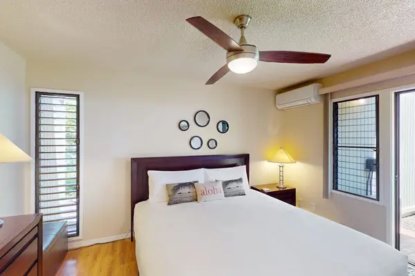 Bright Guest bedroom with cozy bedding for comfort