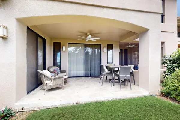 Private Patio Surrounded By Tropical Greenery