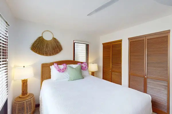 Comfortable Queen bed in a bright tropical retreat