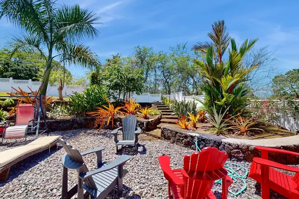 Tropical Backyard Made For Gathering