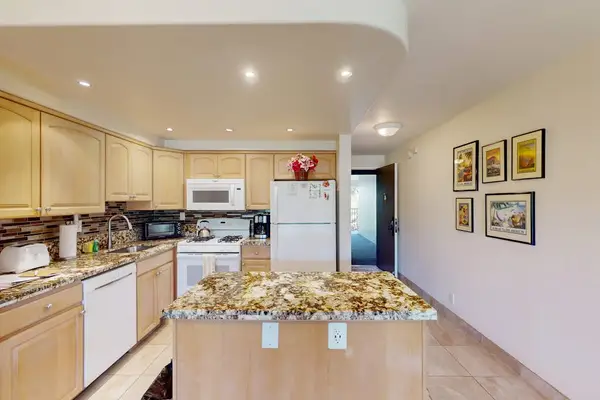 Gather Around The Spacious Island Kitchen