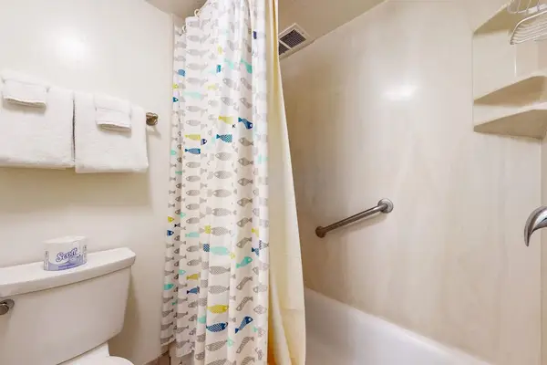 Clean Bathroom With Tub And Shower