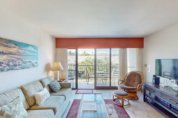 Bright Living Room With Balcony Access
