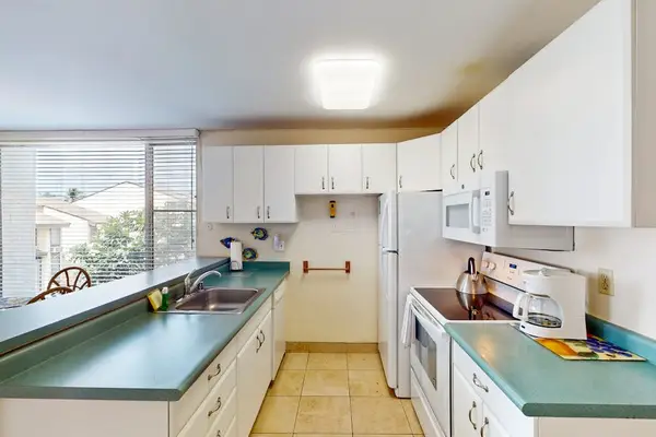 Fully Equipped Kitchen With Modern Appliances