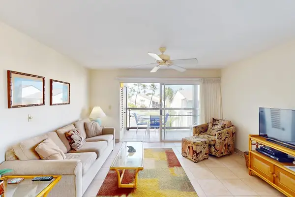 Cozy Living Room With Balcony Access