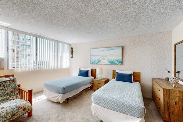 Natural light fills the sleeping area, creating a bright and inviting space to unwind.