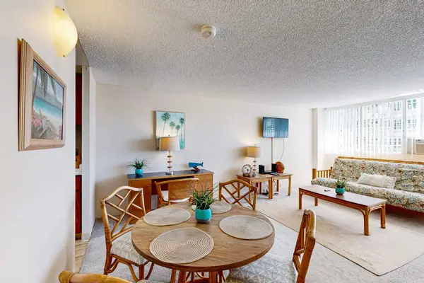 Open-concept studio features a dining area, comfortable living space, and a welcoming layout for families or small groups.