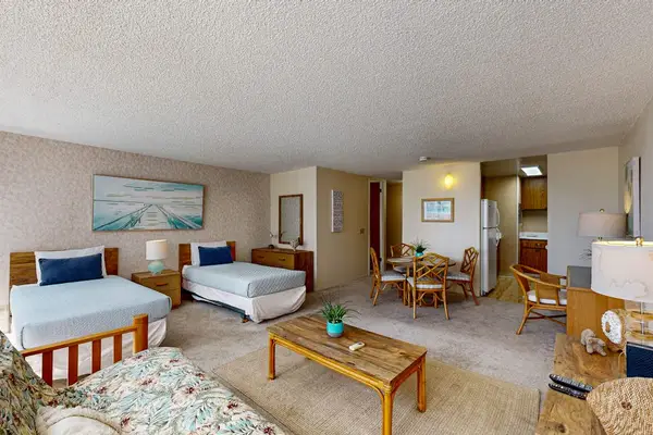 Spacious studio offers comfortable sleeping accommodations, a cozy living area, and a fully equipped kitchen.