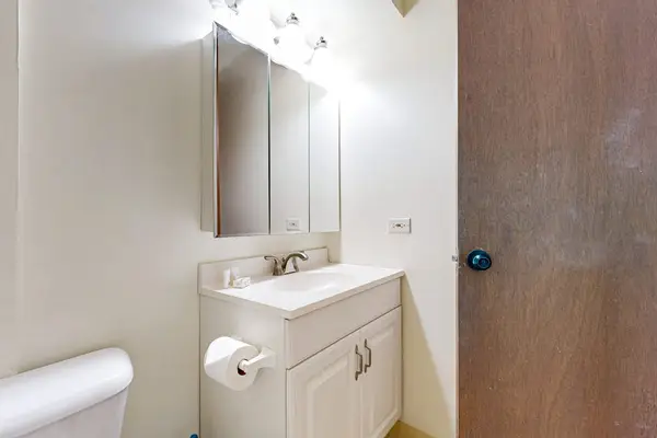 Get ready for your day in Honolulu at the well-lit bathroom vanity, which features a mirrored medicine cabinet and under-sink storage.