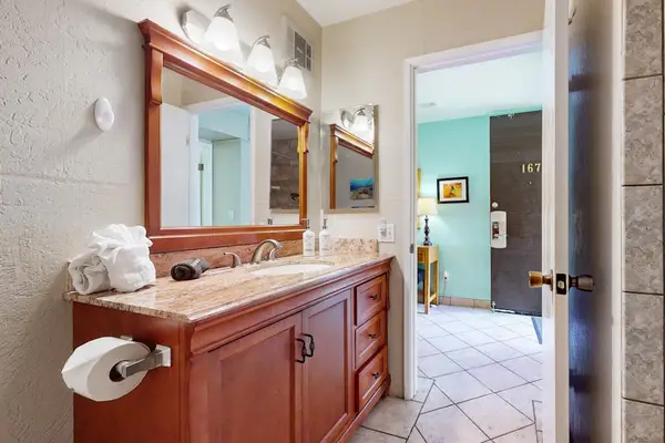 Bright bathroom with shower and vanity