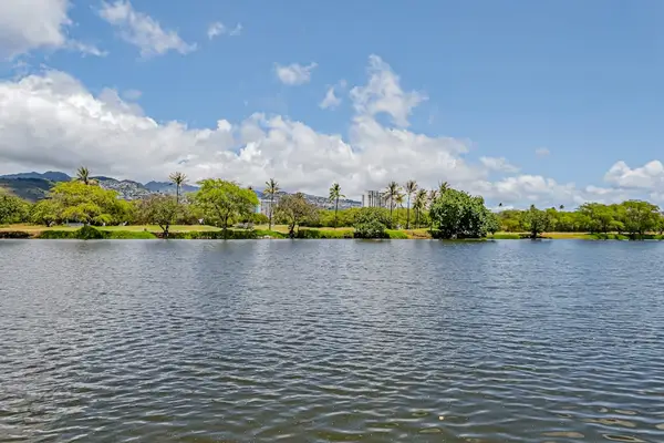 Take a scenic stroll along the nearby Ala Wai Canal, which offers peaceful water views bordered by lush tropical trees.