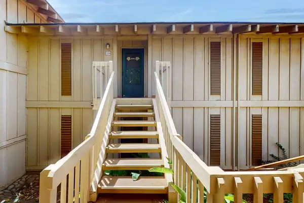 Stairway entrance provides easy access to the elevated island home