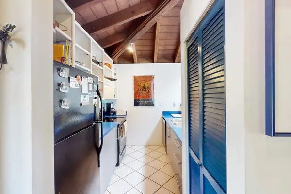 Well equipped kitchen provides practical space for preparing island meals