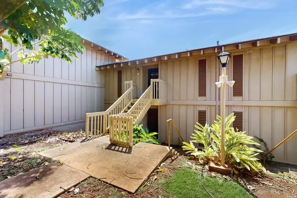 Side pathway and stairs connect home with landscaped outdoor areas
