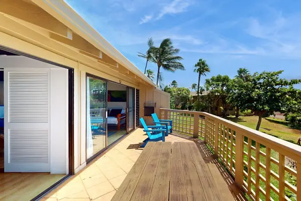 Balcony provides shaded seating and peaceful tropical surroundings nearby