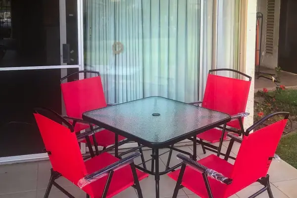 Enjoy outdoor dining and morning coffee on your private covered lanai