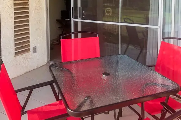 Enjoy outdoor meals and morning coffee on the covered lanai
