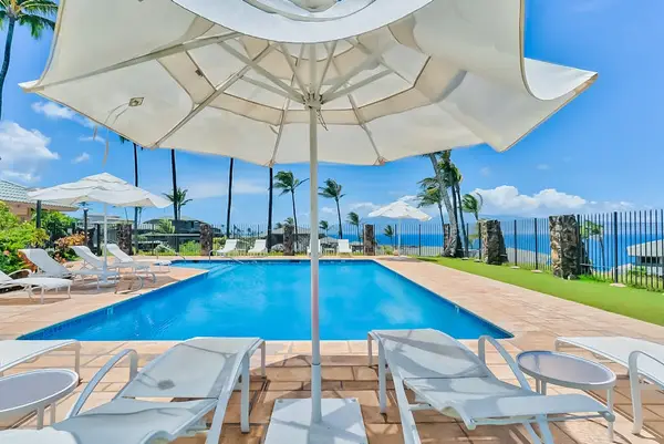 Oceanfront Infinity Pool Beneath Sunny Skies