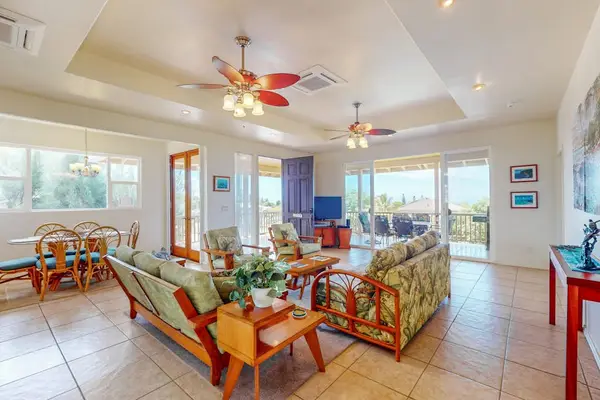 Spacious great room fills with natural light and comfortable seating