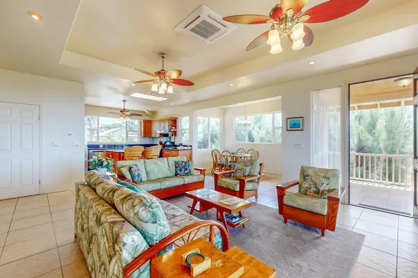 Cozy living area features comfortable seating for relaxed family evenings