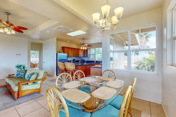Open concept living and dining space creates inviting gathering area