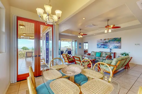 Indoor outdoor dining area connects comfortably with the surrounding balcony