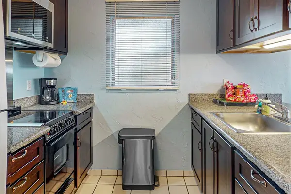 Full remodeled kitchen with new stainless steel appliances.