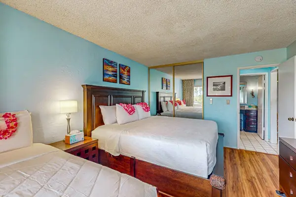 Master bedroom with king bed, single bed and a fold up crib for your use.