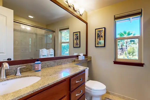 Guest bathroom with tub/shower combo.