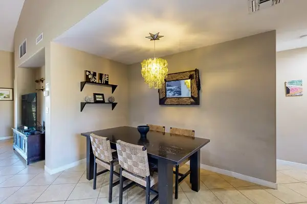 Dining room with seating for four for a nice dinner or great for a night in and games with the family.