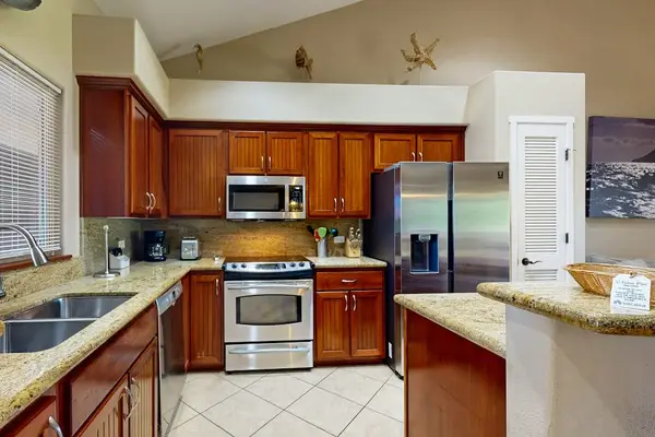 Newly remodeled kitchen with stainless steel appliances.
