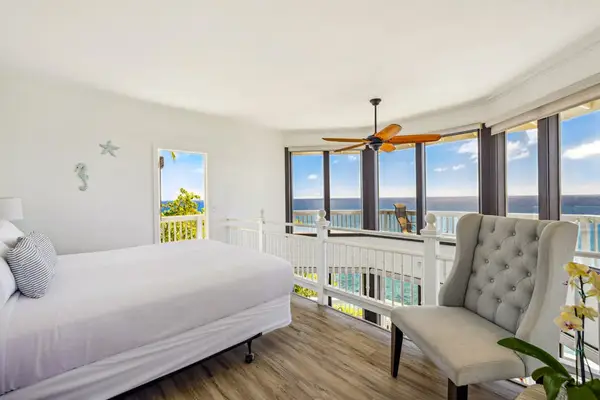Loft area with a queen bed.