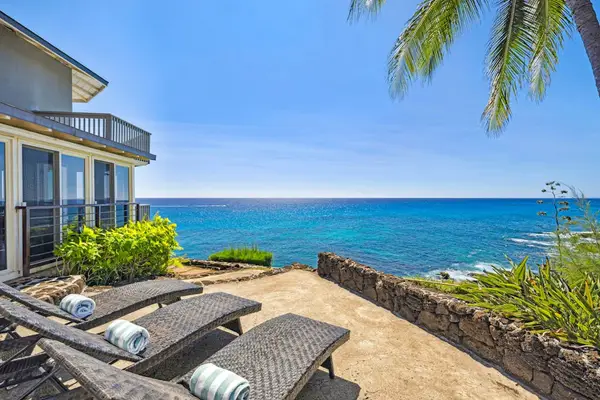 From your oceanfront perch on a lava-rock cliff, a dazzling ombre of blues tantalizes the eyes and the smell of saltwater tickles your nose. Let the ocean breezes warm you as you lounge on multiple lanais, listening to the waves crash below.