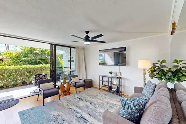Sunlit Living Room Opening to Private Patio