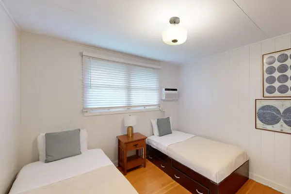 Second bedroom provides cozy twin accommodations for peaceful evenings every vacation night