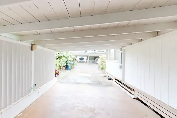 Convenient carport offers sheltered parking just steps from the welcoming home entrance
