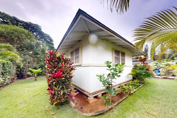 Lush greenery surrounds the backyard creating a peaceful outdoor retreat every day