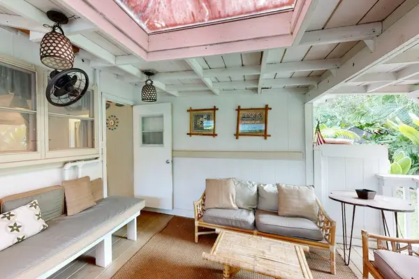 Balcony provides generous seating for relaxing meals and peaceful island mornings outside