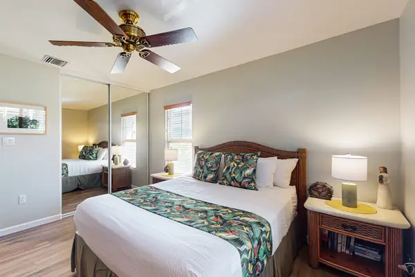 Restful Retreat Equipped With Ceiling Fan And Built-In Storage