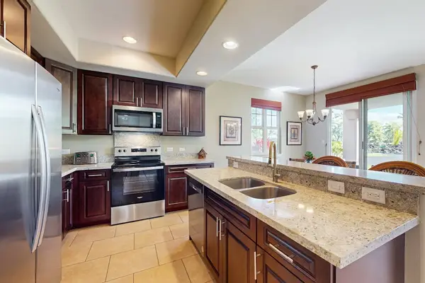 Modern Chef's Kitchen Complete With Island Prep Bar