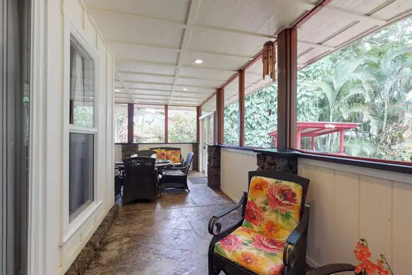 Plenty of seating on the lanai to relax and read a book or sit and dine.