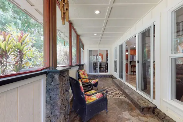 Plenty of seating on the lanai to relax and read a book or sit and dine.