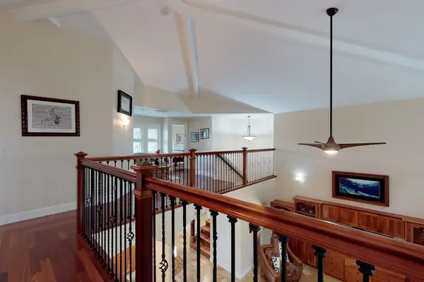 Loft open to the living room below, allowing for that spacious feel.