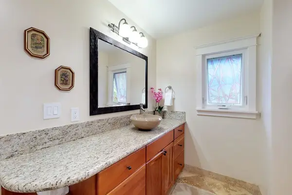 Guest bathroom with walk-in shower.