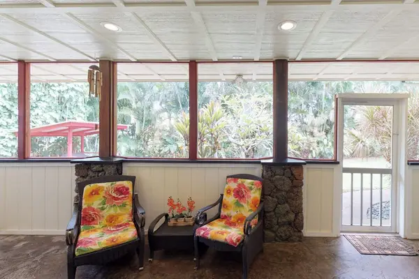 Plenty of seating on the lanai to relax and read a book or sit and dine.