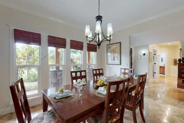 Dining room table with seating for eight - another table for extra seating.
