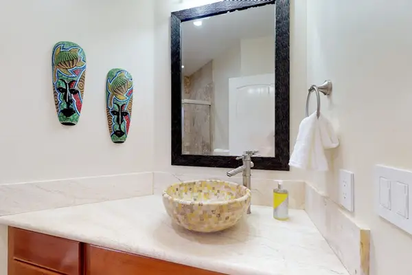 Guest bathroom with tub/shower combo.